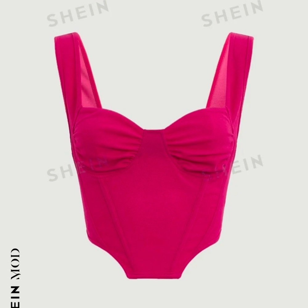 This shirt is a stunning pink corset top from SHEIN!